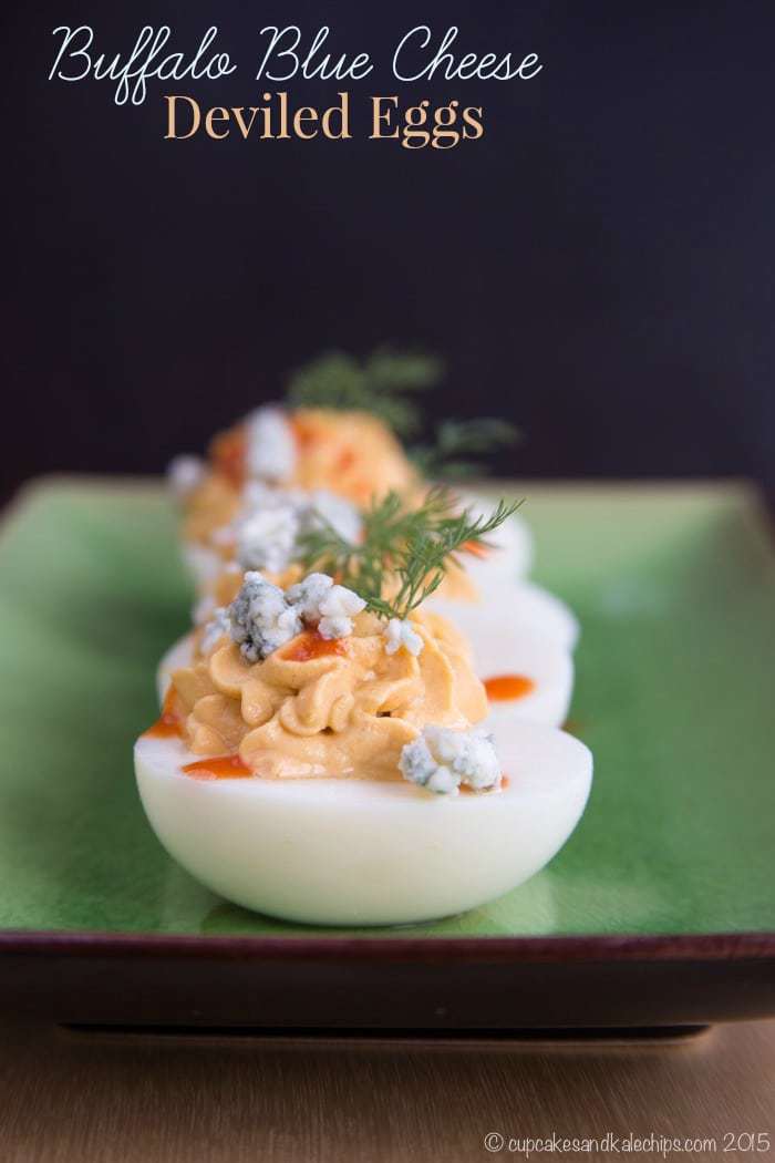 Buffalo Blue Cheese Deviled Eggs - this spicy twist on the classic deviled egg recipe adds your favorite wing flavors of hot sauce and blue cheese to the classic picnic menu staple. A perfect party appetizer or a low carb, high protein snack.