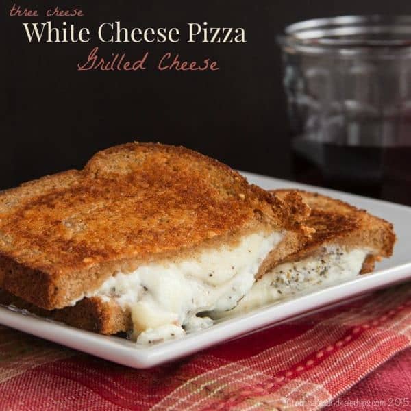 Three Cheese White Cheese Pizza Grilled Cheese combines the cheesy goodness of white pizza and the classic comfort food sandwich in one. No need to order delivery or make pizza crust! | cupcakesandkalechips.com | vegetarian