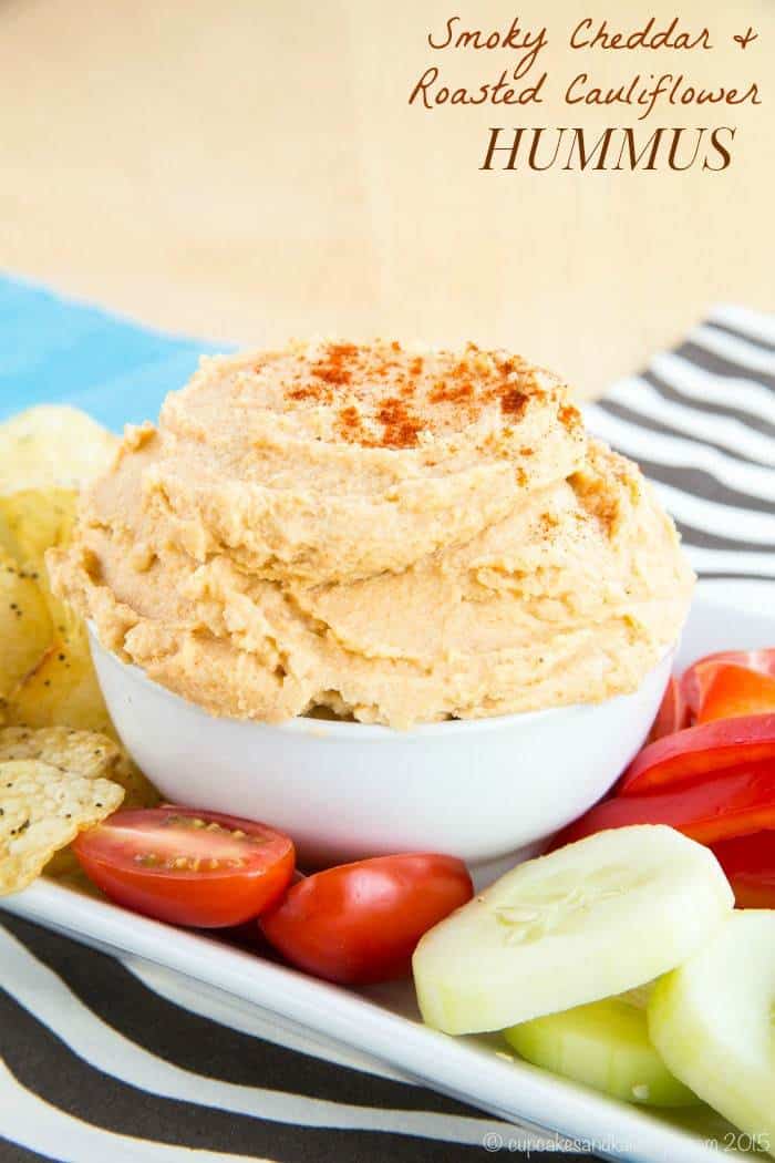 Smoky Cheddar Roasted Cauliflower Hummus is a smooth and creamy healthy dip recipe with great cheesy flavor and hidden vegetables. Serve with veggies, chips, or pita for an appetizer or snack that's gluten free and vegetarian recipe. #hummus #glutenfree #cauliflower