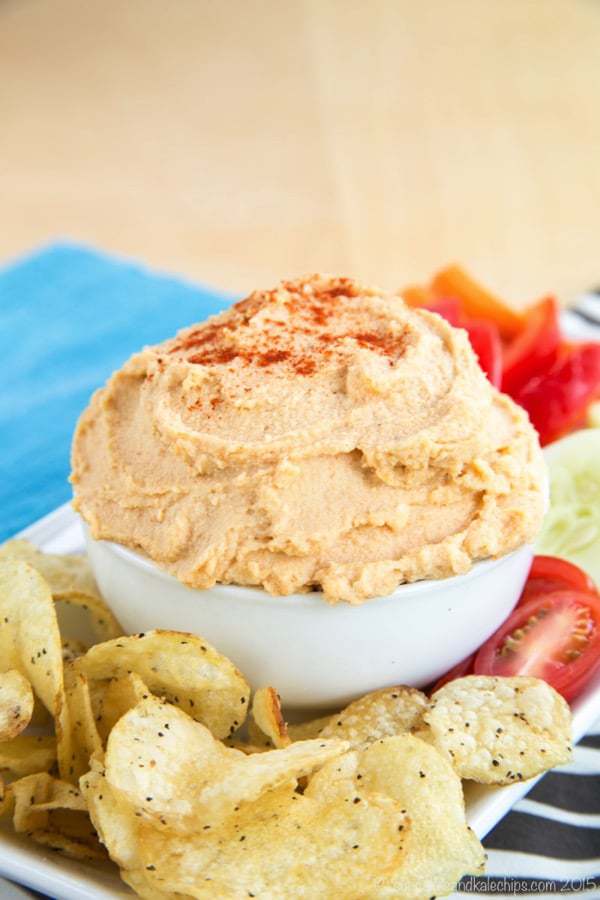 Smoky Cheddar Roasted Cauliflower Hummus - everyone will love this cheesy hummus recipe with hidden veggies! A delicious healthy dip for vegetables, chips, or pita. #glutenfree #dip #hummus #diprecipe #hiddenveggies