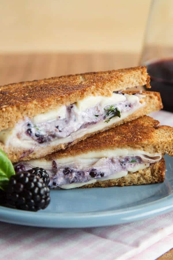 Ham, Blackberry Ricotta, and Fresh Mozzarella Grilled Cheese - this recipe takes the classic comfort food sandwich to fancy pants with plenty of ooey gooey cheesy goodness and a touch of sweet summer berries. | cupcakesandkalechips.com