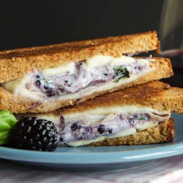 Ham, Blackberry Ricotta, and Fresh Mozzarella Grilled Cheese - this recipe takes the classic comfort food sandwich to fancy pants with plenty of ooey gooey cheesy goodness and a touch of sweet summer berries. | cupcakesandkalechips.com