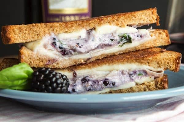 Ham, Blackberry Ricotta, and Fresh Mozzarella Grilled Cheese - this recipe takes the classic comfort food sandwich to fancy pants with plenty of ooey gooey cheesy goodness and a touch of sweet summer berries. | cupcakesandkalechips.com