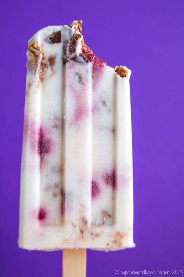 Raspberry Chocolate Almond Crunch Frozen Yogurt Popsicles - cool off this summer with a cold, creamy treat filled with berries and Cascadian Farm Dark Chocolate Almond Coconut Granola Bark. #AD | cupcakesandkalechips.com | gluten free recipe