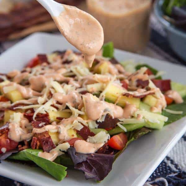 Bacon Barbecue Ranch Salad topped with Homemade Greek Yogurt Barbecue Ranch Salad Dressing - a simple side salad perfect for a California Pizza Kitchen Gluten-Free Crispy Thin Crust pizza night or with grilled chicken. #mycpkpizza #AD | cupcakesandkalechips.com | gluten free recipe