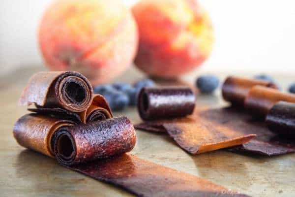Blueberry Peach Fruit Roll-Ups swirl together two favorite summer fruits into one sweet and healthy snack perfect to pack in a lunchbox. | cupcakesandkalechips.com | gluten free, vegan, paleo recipe