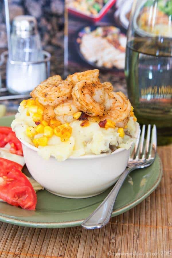 Home-Style Shrimp Bowls - quick and easy comfort food! Slightly spicy shrimp, crisp corn, and creamy mashed potatoes are a quick and easy dinner for busy evenings! You'll love this recipe from the Express Lane Cooking cookbook by Shawn Syphus of iwashyoudry.com | cupcakesandkalechips.com | gluten free