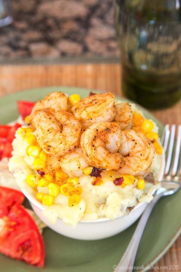 Home-Style Shrimp Bowls - quick and easy comfort food! Slightly spicy shrimp, crisp corn, and creamy mashed potatoes are a quick and easy dinner for busy evenings! You'll love this recipe from the Express Lane Cooking cookbook by Shawn Syphus of iwashyoudry.com | cupcakesandkalechips.com | gluten free