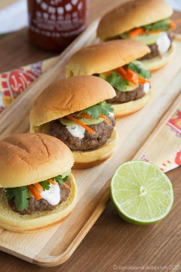 A row of Thai sliders on a platter from overhead