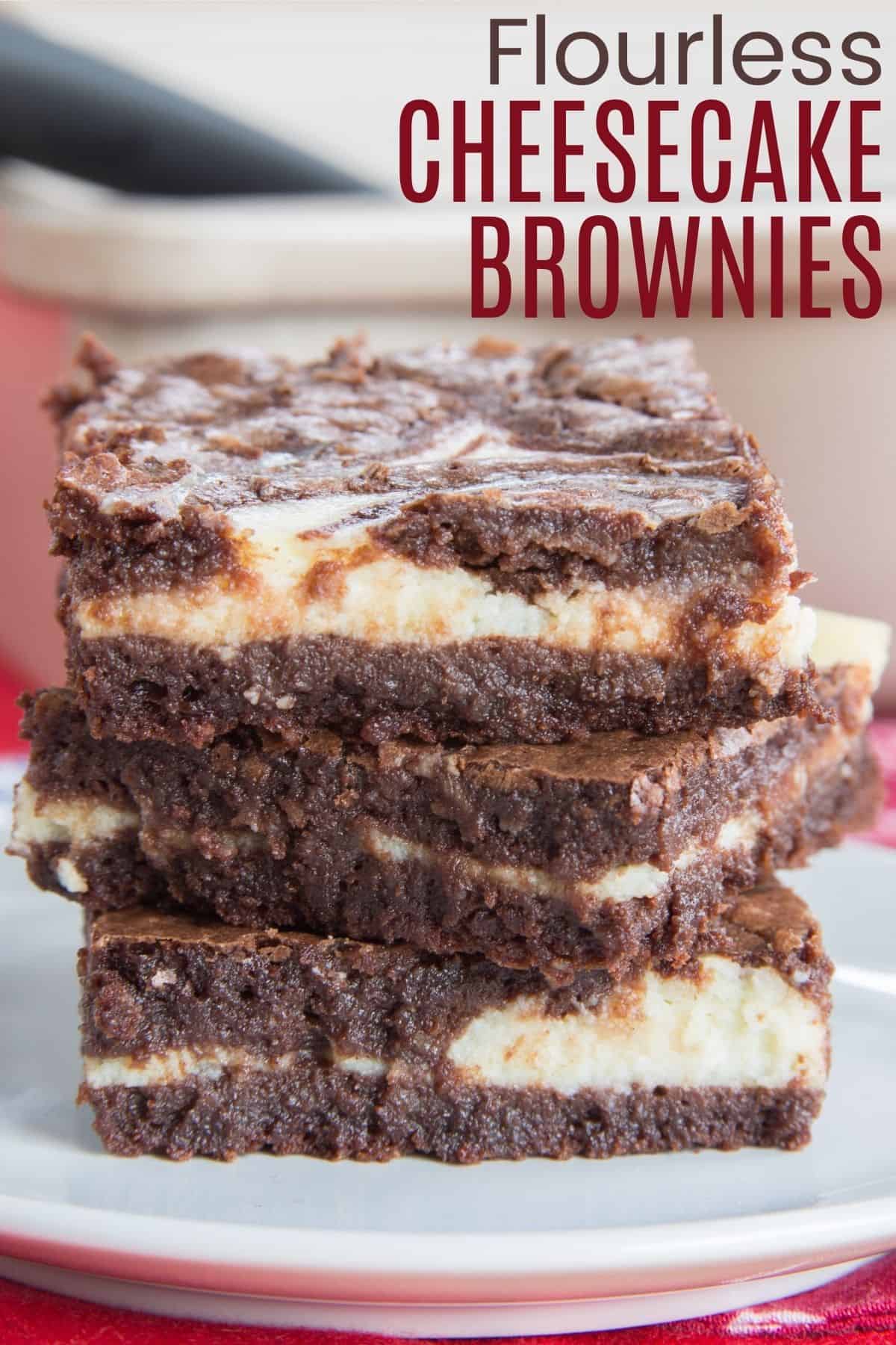 Three cheesecake brownies on a plate
