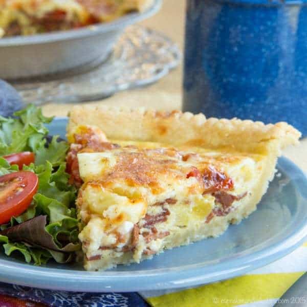 Bacon Cheddar Quiche with Tomato and Pineapple - a salty sweet breakfast or brunch recipe. My family loved this as breakfast for dinner! Use your favorite pie crust recipe, or my new favorite gluten free recipe. | cupcakesandkalechips.com