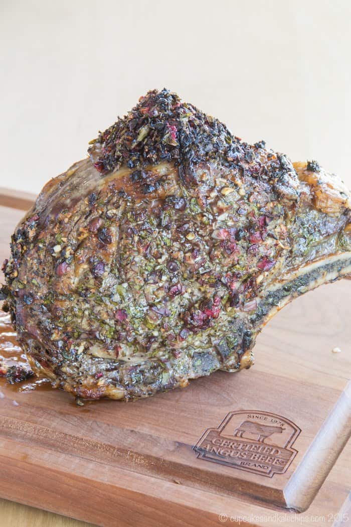 Whole Cranberry Crusted Prime Rib Roast on a cutting board