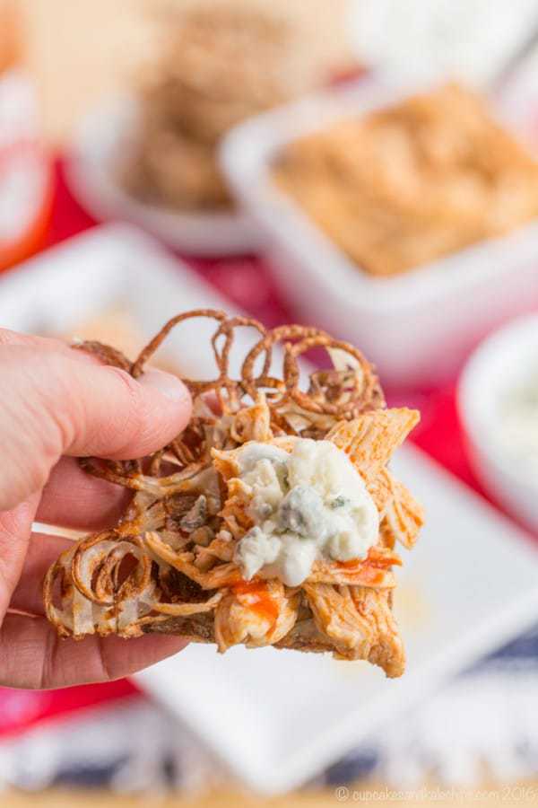 Buffalo Chicken Poutine on Potato Waffles - a fun and spicy version of the usual loaded French fries is great for dinner or snacking during the big game! | cupcakesandkalechips.com 