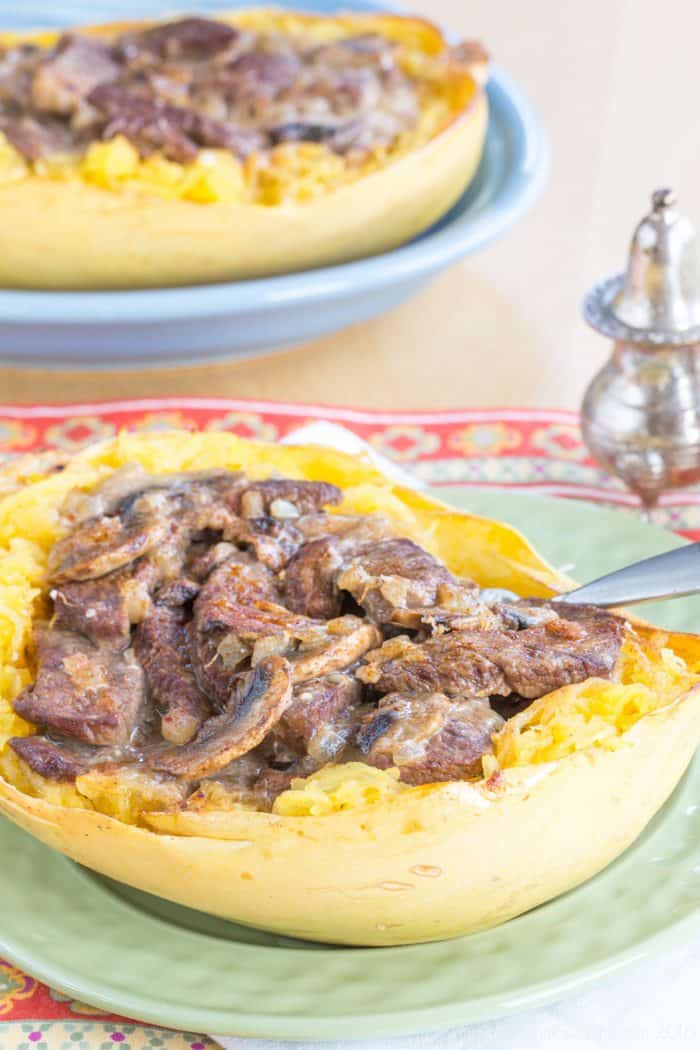 Half os a spaghetti squash stiffed with sliced beef and mushrooms