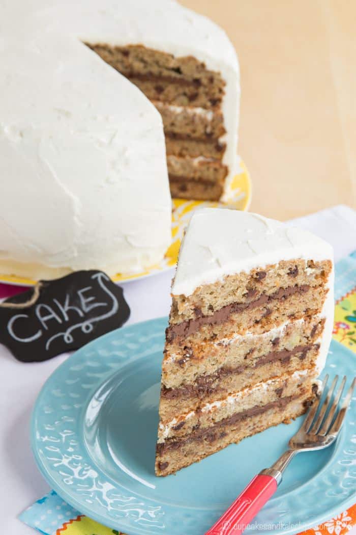 A slice of banana layer cake with layers of Nutella and cream cheese frosting