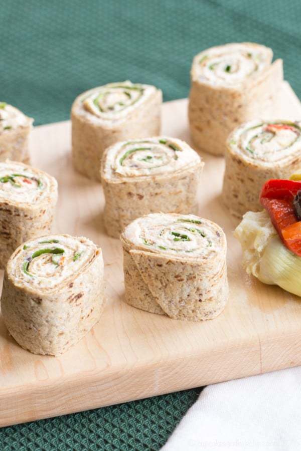 Mediterranean Chicken Pinwheels - all you need is a few ingredients including leftover rotisserie chicken to make this easy lunch or appetizer recipe. For a gluten free and low carb option, it makes tasty lettuce wraps! | cupcakesandkalechips.com