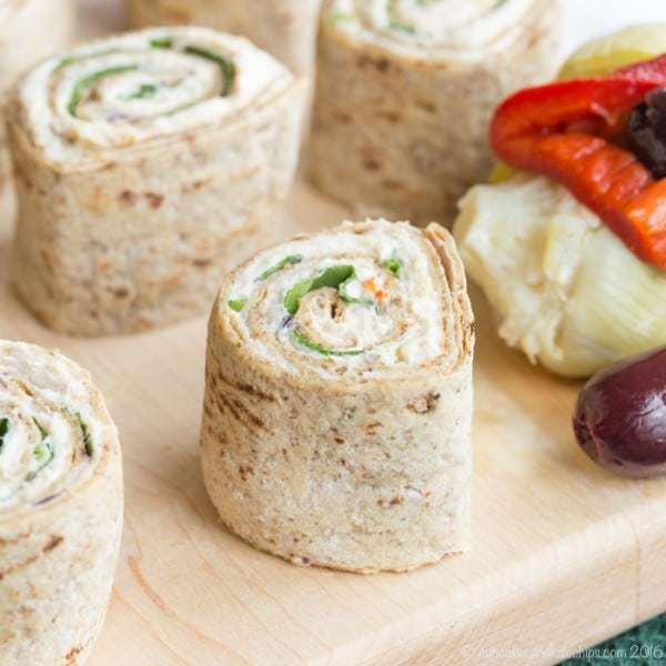 Mediterranean Chicken Pinwheels - all you need is a few ingredients including leftover rotisserie chicken to make this easy lunch or appetizer recipe. For a gluten free and low carb option, it makes tasty lettuce wraps! | cupcakesandkalechips.com