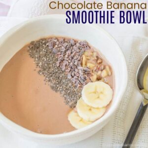 Smoothie bowl with bananas, chia seeds, walnuts, and cacao nibs on top