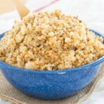 Cauliflower rice side dish recipe in a blue serving bowl