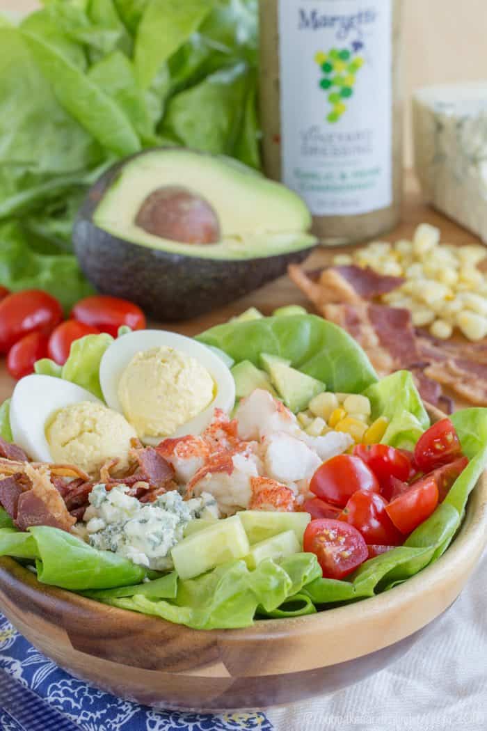 Cobb Salad with Lobster plus deviled eggs, bacon, blue cheese, avocado, corn, and tomatoes