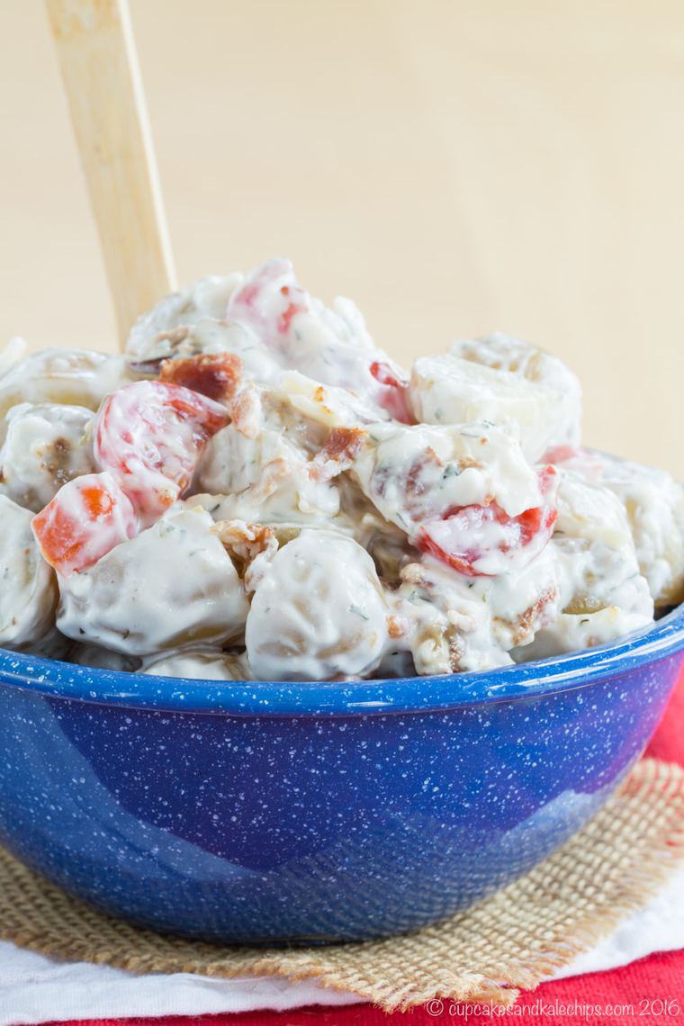 Cheddar Bacon Ranch Potato Salad served in a blue speckled bowl
