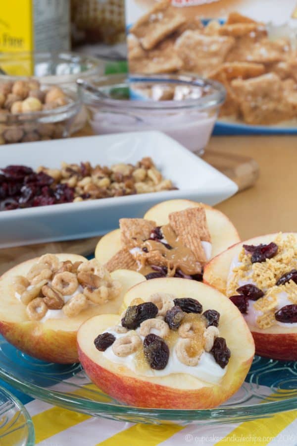 How to Make Cereal and Yogurt Stuffed Apples for a fun and nutritious after-school snack. Try these eight tasty combos or come up with your favorite, with gluten free, nut free, and peanut free options. #ad | cupcakesandkalechips.com