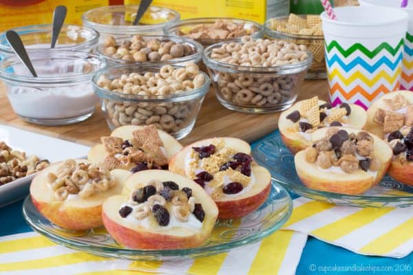 How to Make Cereal and Yogurt Stuffed Apples for a fun and nutritious after-school snack. Try these eight tasty combos or come up with your favorite, with gluten free, nut free, and peanut free options. #ad | cupcakesandkalechips.com