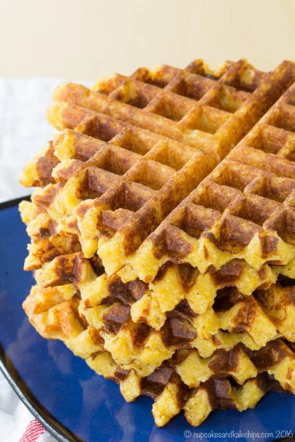 Cheesy Polenta Waffles - this savory waffle recipe makes a delicious side dish any time you'd serve polenta or even cheddar grits, or serve it for breakfast topped with eggs. | cupcakesandkalechips.com | gluten free