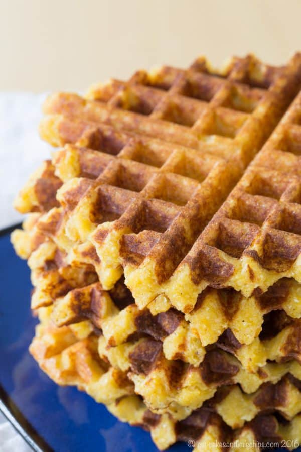 Cheesy Polenta Waffles - this savory waffle recipe makes a delicious side dish any time you'd serve polenta or even cheddar grits, or serve it for breakfast topped with eggs. | cupcakesandkalechips.com | gluten free