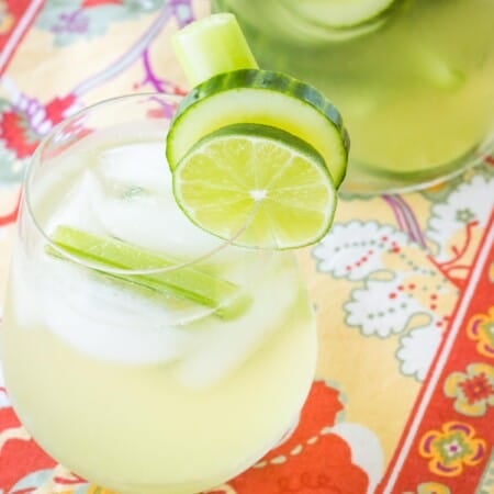 Pitcher and glass of a white wine sangria.