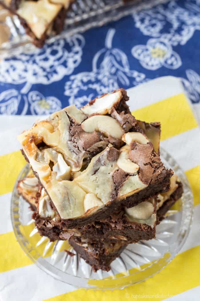 Caramel cheesecake swirl brownies with cashews.