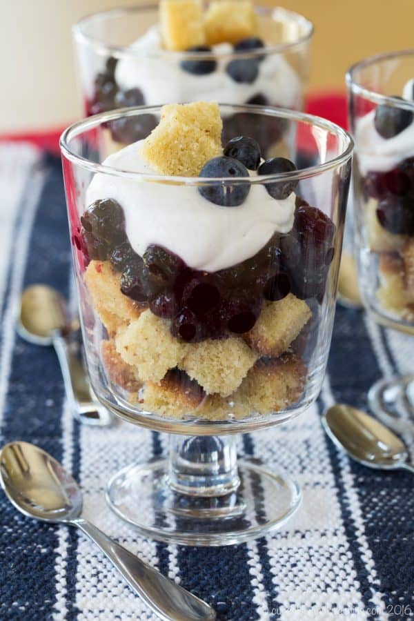 Mini Roasted Blueberry and Coconut Cream Trifles - a little individual trifle is a simple dessert recipe that's sure to impress. Use homemade or storebought pound cake, or even this gluten free option. | cupcakesandkalechips.com