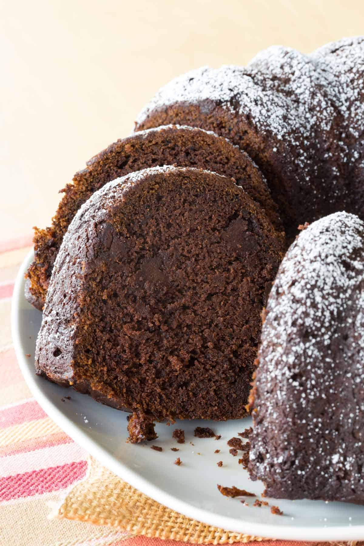 Sliced gluten free bundt cake on a platter