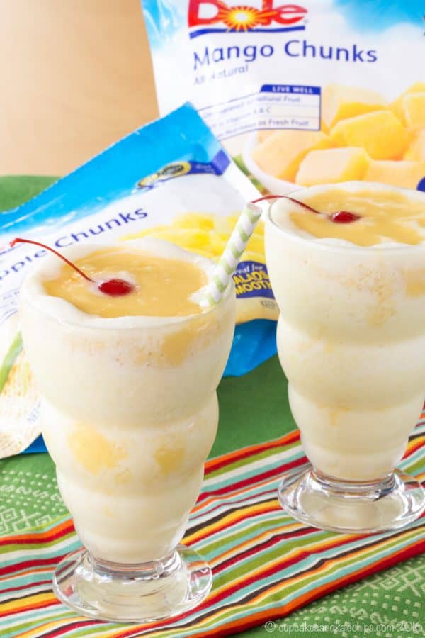 Mango Lava Flow Smoothies - swirl mango puree and a pina colada smoothie for a healthy breakfast or snack recipe for the whole family made with @dolesunshine! #ad Gluten free, dairy free option. | cupcakesandkalechips.com