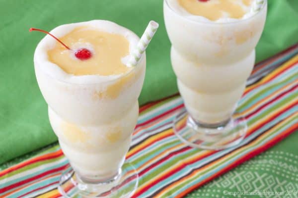 Mango Lava Flow Smoothies - swirl mango puree and a pina colada smoothie for a healthy breakfast or snack recipe for the whole family made with @dolesunshine! #ad Gluten free, dairy free option. | cupcakesandkalechips.com