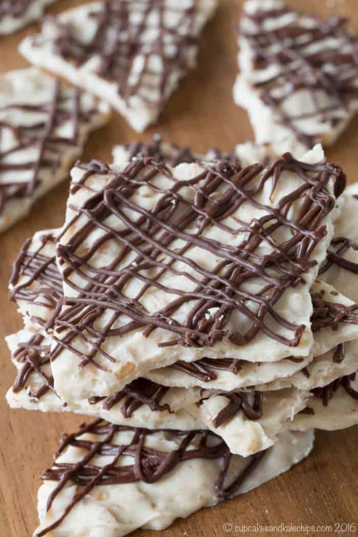 Stack of Toffee Pumpkin Spice White Chocolate Bark drizzled with dark chocolate