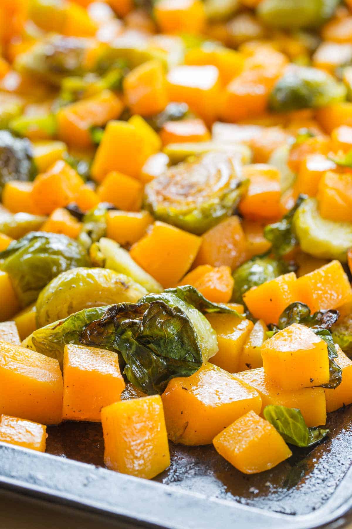 Maple Roasted Brussel Sprouts and Butternut Squash on a sheet pan.