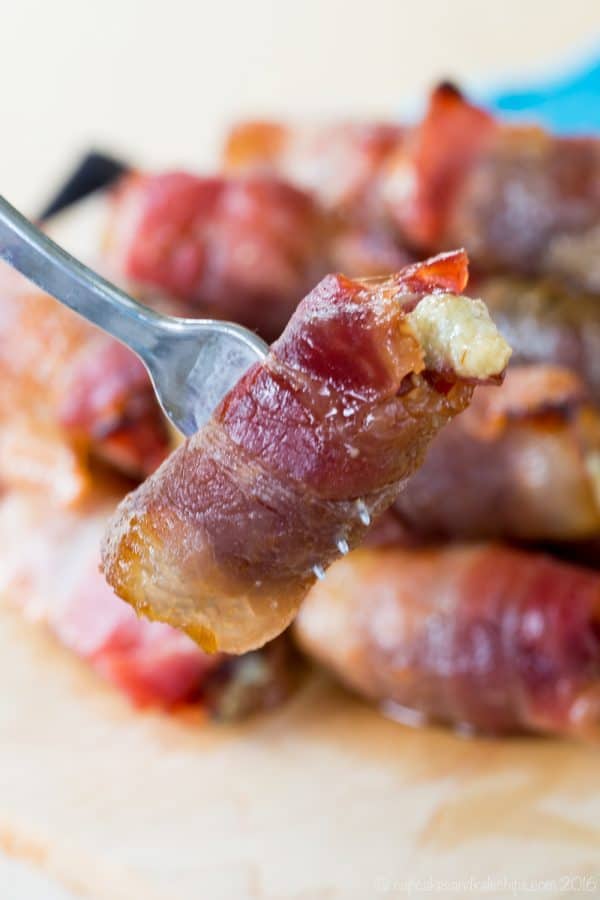 Sweet and Spicy Blue Cheese Bacon Wrapped Dates coated in a honey lime sriracha glaze will be your new favorite party appetizer recipe!