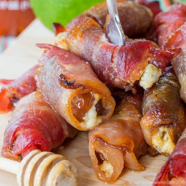 Sweet and Spicy Blue Cheese Bacon Wrapped Dates coated in a honey lime sriracha glaze will be your new favorite party appetizer recipe!