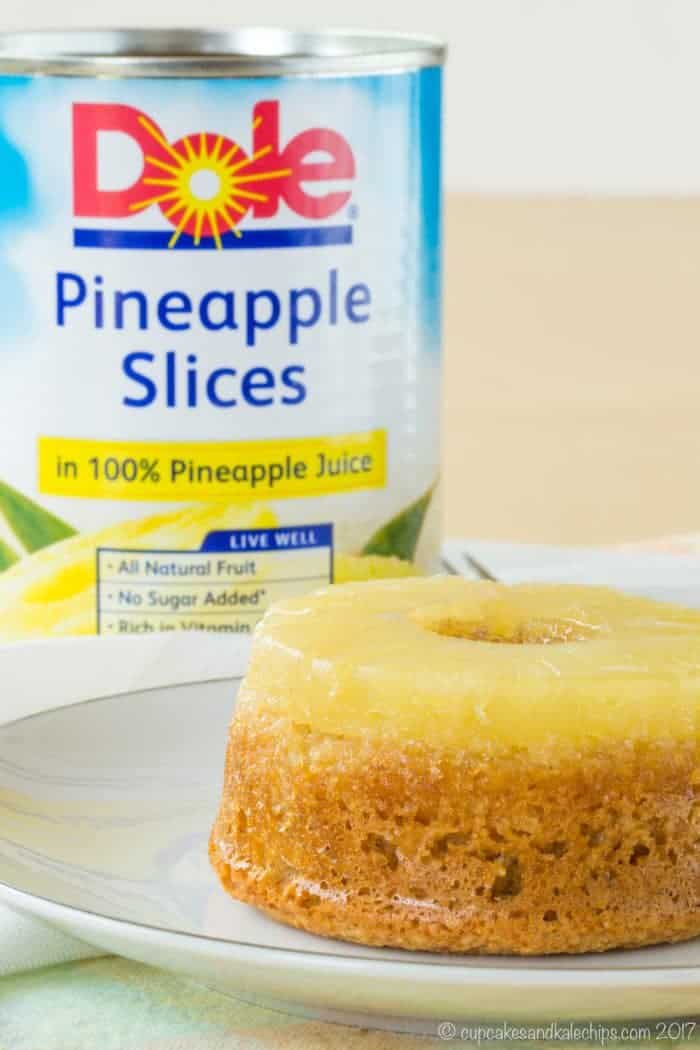 Can of Dole Pineapple Slices behind a mini pineapple upside down cake