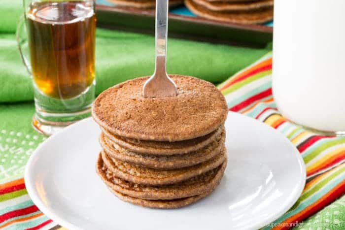 Gluten Free Chocolate Banana Oatmeal Pancakes on a white plate