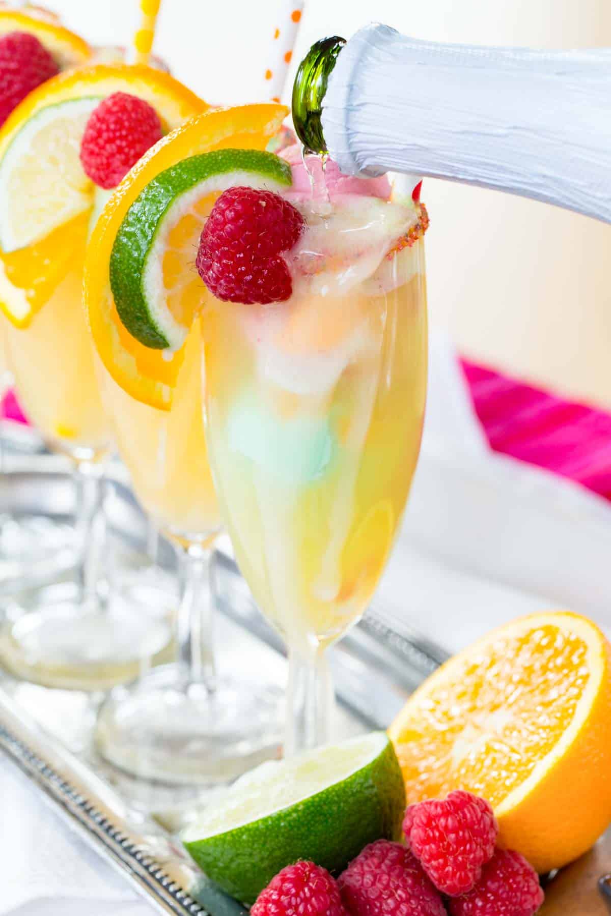 Sparkling Cider Being Poured Into a Flute with Two Scoops of Sherbet Ice Cream