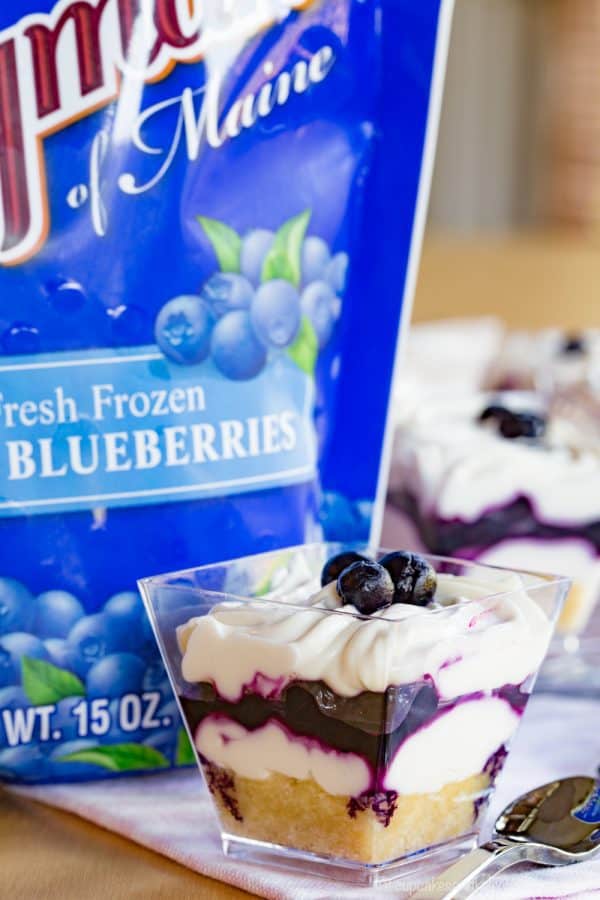 Blueberry Maple Mini Cheesecake Parfaits - an easy no-bake dessert recipe perfect for parties with a gluten free almond meal crust and @WymansofMaine frozen wild blueberries. #AD