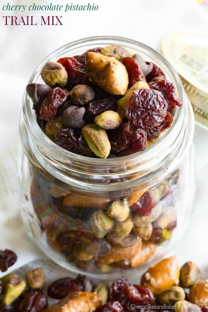 Cherry Chocolate Pistachio Trail Mix - a sweet and salty snack mix that will satisfy you with protein and fiber when afternoon hunger strikes. In the office or outside having fun, you'll love this combination of dried cherries, chocolate chips, pretzels, and Wonderful Pistachios from @getcrackin. #AD