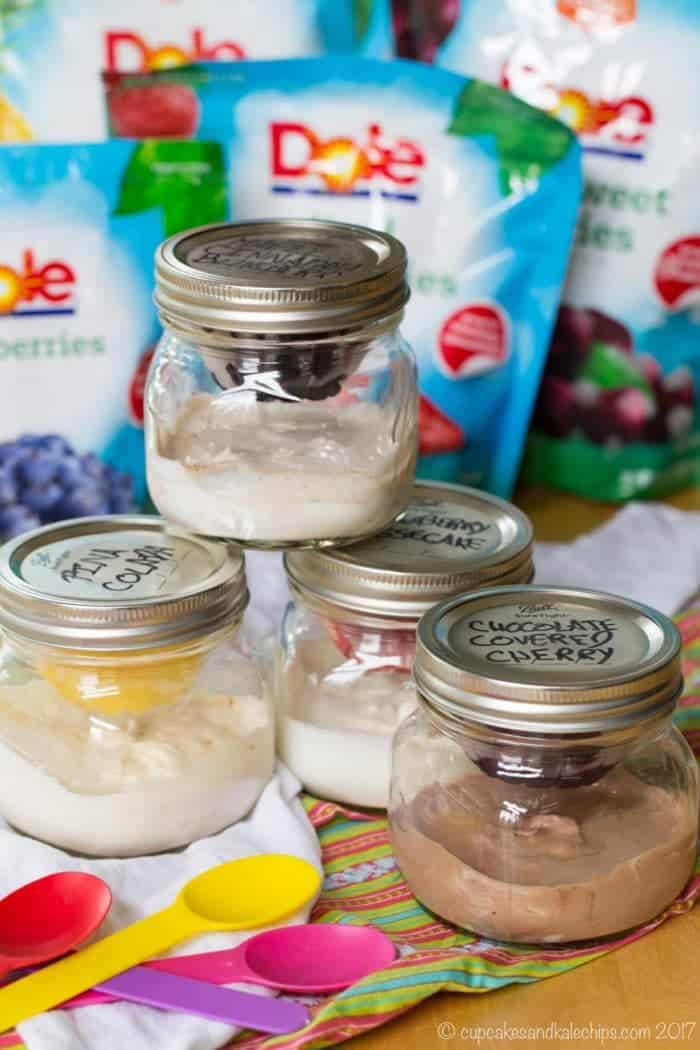 Fruit and Yogurt Parfait in a Jar - this snack hack has only four ingredients to make Maple Cinnamon Blueberry, Strawberry Cheesecake, Chocolate Covered Cherry, and Pina Colada yogurt snacks with @dolesunshine to #SharetheSunshine #AD