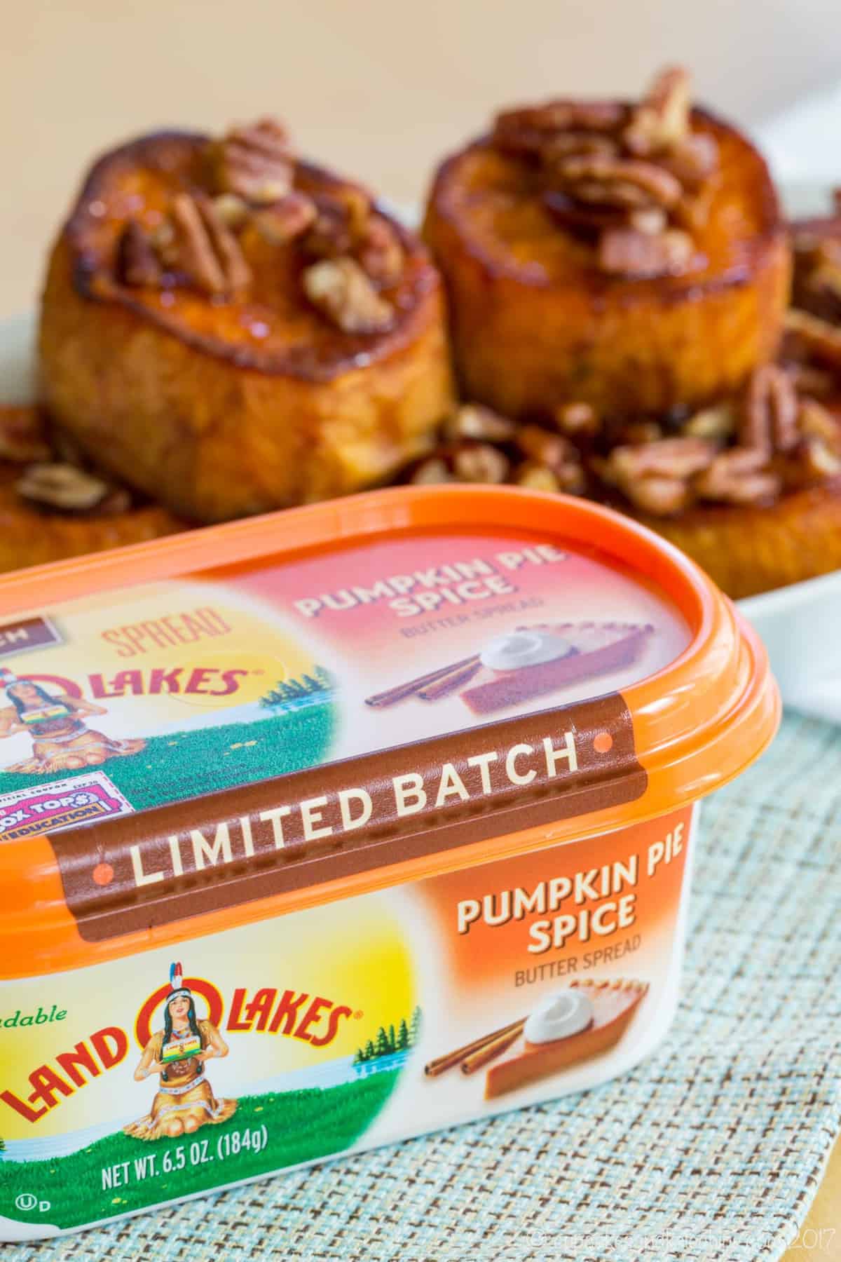 Land O'Lakes Pumpkin Spice Butter Spread with melting sweet potatoes in the background