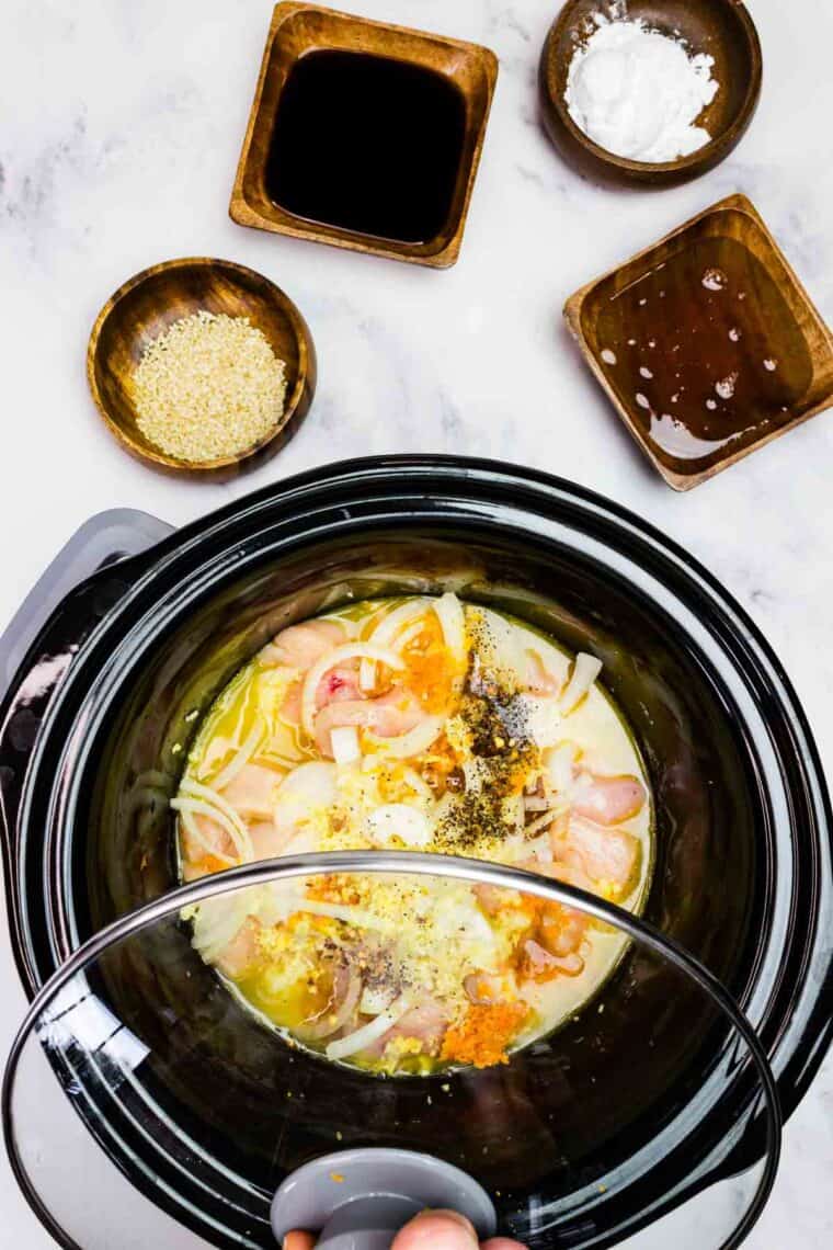 Placing the lid on the slow cooker