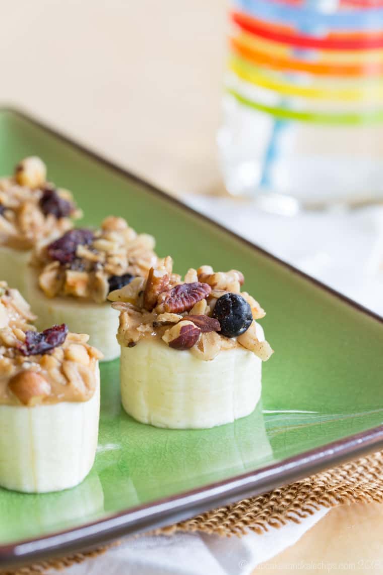 Closeup of one of these Healthy Peanut Butter Banana Snacks topped with granola