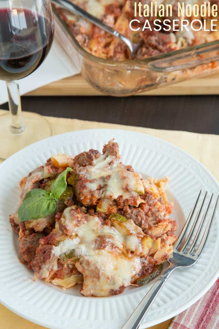 Italian Noodle Casserole - with layers of creamy noodles, meaty sauce and bubbly cheese, this is a lightened up version of a classic pasta bake recipe. This is comfort food for an easy family dinner, and you can even use gluten free noodles. #cupcakesandkalechips #pasta #casserole #glutenfree #comfortfood #noodles #groundbeef #easyrecipe #familyfriendly