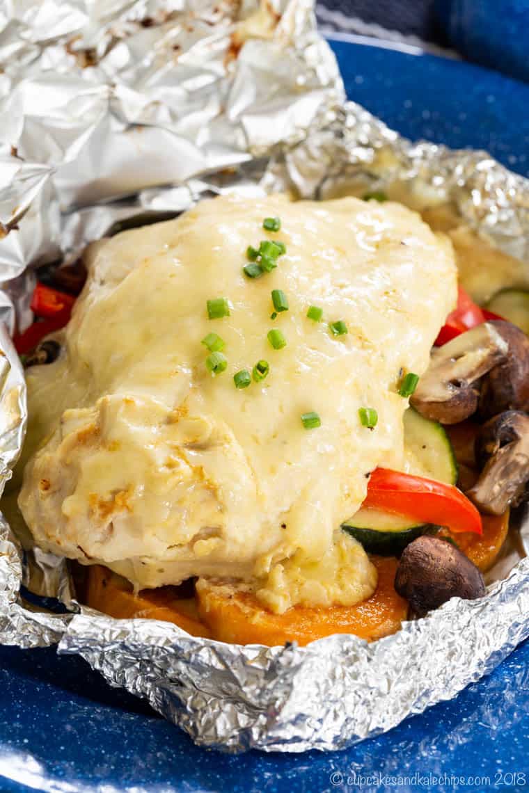 Closeup of Cheesy Maple Dijon Chicken Foil Packets with Veggies grilled or baked